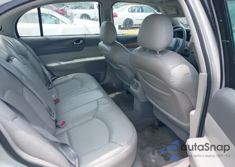 1999 Lincoln Continental z USA, uszkodzony, nr VIN 1LNHM97V7XY607937